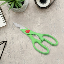 Full view of kitchen scissors showing its versatility for food preparation and bottle opening.